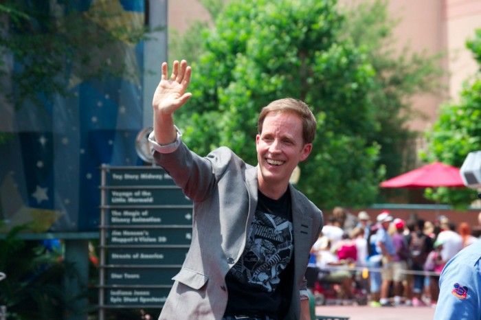 Star Wars Celebrity Host James Arnold Taylor waves to the crowd.