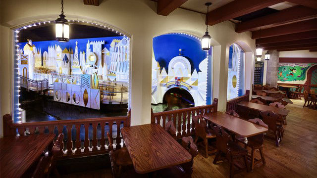 Grab a table in this popular and coveting seating area to overlook It's A Small World. Photo courtesy of Disney (c)