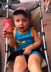 toddler at epcot enjoying epcot's club cool drink offerings