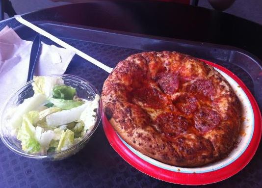 Cup-o-salad and pepperoni pizza