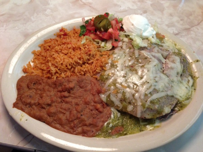 The stacked enchiladas at Chuy's come with blue corn tortilla and a fresh tomatillo sauce. (Photo by Julia Mascardo)