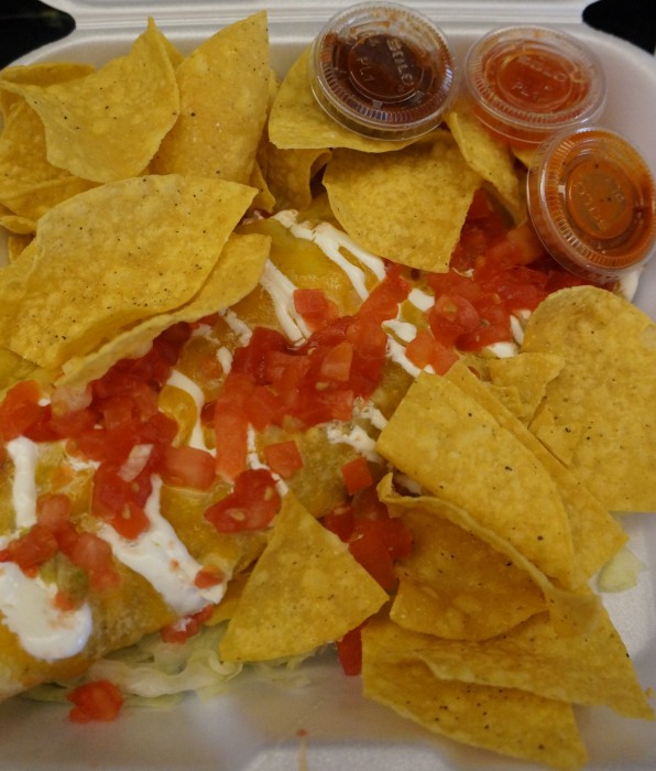 Enchiladas from Tijuana Flats makes a flavorful meal to go. Don't forget the hot sauces! (Photo by Julia Mascardo)