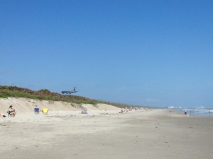 Unspoiled shoreline at Hangars Beach - complete with low-flying military plane.