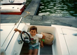 Me in one of my favorite attractions as a child (that isn't there anymore)  Motor Boat Cruise.