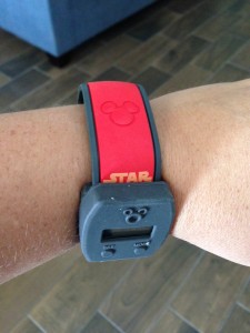 This is how you actually have to place it--on one side or the other, but not covering the Mickey on your MagicBand. (Photo by Julia Mascardo)