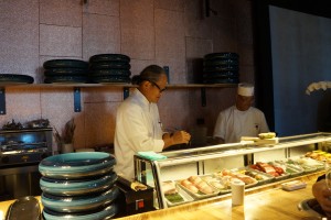 Chef Masaharu Morimoto (left) hard at work at the sushi bar. (Photo by Julia Mascardo)