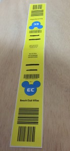 Yellow luggage tag, front. 