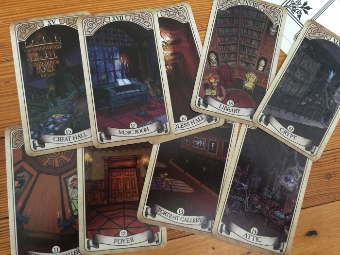 A packet of Tarot-like cards, different from the cards in the first box. 