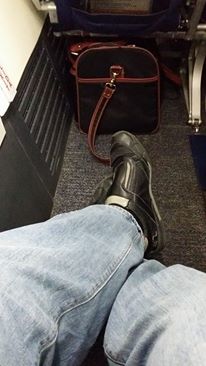 If a tray table isn't important to you, this exit row seat provides ample legroom