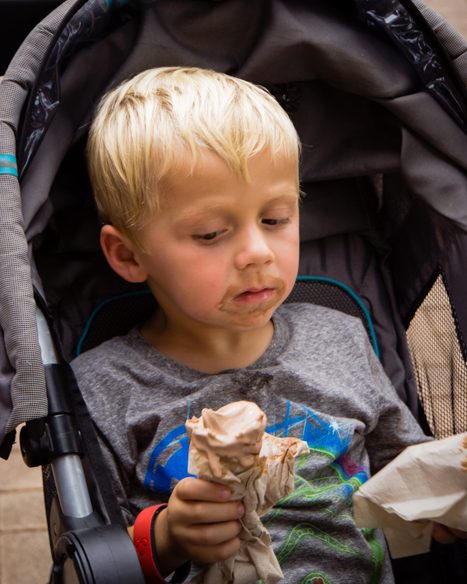 child covered in ice cream